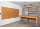 Well-lit garage space with a wooden workbench at 3426 Dry Gulch Dr, Laughlin, NV 89029