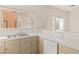 Bright kitchen featuring tiled countertops, stainless steel sink and ample counter space at 3426 Dry Gulch Dr, Laughlin, NV 89029