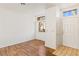 Bright living room featuring wood floors, neutral walls, and a front door at 3426 Dry Gulch Dr, Laughlin, NV 89029