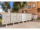 Image of clustered mailboxes in a condo complex, showing the arrangement of the individual mail units and building exteriors at 3426 Dry Gulch Dr, Laughlin, NV 89029