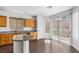 Bright kitchen featuring modern countertops, cabinetry and natural light from a sliding glass door at 3637 Pinnate Dr, Las Vegas, NV 89147