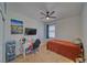 Comfortable bedroom with a desk, bed, and window providing natural light at 3854 E Chaffe Ave, Pahrump, NV 89061