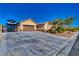 Charming home featuring a spacious driveway, RV parking, and a well-maintained front yard at 3854 E Chaffe Ave, Pahrump, NV 89061