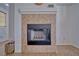 Close-up of a fireplace featuring decorative tile surround at 3854 E Chaffe Ave, Pahrump, NV 89061