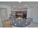 Modern kitchen with granite countertops, dark wood cabinets and stainless steel appliances at 3854 E Chaffe Ave, Pahrump, NV 89061