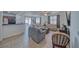 Open living room with tile flooring, comfortable seating and lots of natural light at 3854 E Chaffe Ave, Pahrump, NV 89061