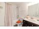 A cozy bathroom features a shower-tub combination with vanity, toilet, and coordinated hardware at 3949 S Torrey Pines Dr, Las Vegas, NV 89103