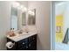 This charming bathroom features a vanity with framed mirror and stylish fixtures at 3949 S Torrey Pines Dr, Las Vegas, NV 89103
