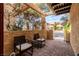 Cozy outdoor patio featuring brick flooring and comfortable seating area at 3949 S Torrey Pines Dr, Las Vegas, NV 89103