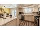 Updated kitchen featuring bright countertops, lots of storage, and stainless steel appliances at 3949 S Torrey Pines Dr, Las Vegas, NV 89103