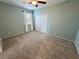Bedroom with carpet, neutral wall color, ceiling fan, and window at 4680 Suntree Ct, Pahrump, NV 89061