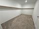 Large walk-in closet with rod and shelf at 4680 Suntree Ct, Pahrump, NV 89061