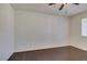 Bedroom featuring sleek wood floors, neutral walls, and bright natural light at 50 Aura De Blanco St # 19203, Henderson, NV 89074