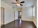 Empty bedroom showing wood floors, ceiling fan, and plantation shutters at 50 Aura De Blanco St # 19203, Henderson, NV 89074