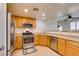 Spacious kitchen features stainless appliances, range, and dishwasher at 50 Aura De Blanco St # 19203, Henderson, NV 89074