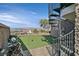 Backyard putting green with spiral staircase and mountain views create an outdoor oasis at 503 Aaron Way, Boulder City, NV 89005
