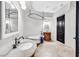 Elegant bathroom with a clawfoot tub, stone floors, and a single vanity at 503 Aaron Way, Boulder City, NV 89005