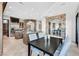 Open kitchen and dining area, featuring stone accents and contemporary furnishings at 503 Aaron Way, Boulder City, NV 89005