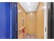 Interior view of wood-paneled elevator with handrail and emergency phone at 503 Aaron Way, Boulder City, NV 89005
