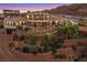 Expansive home with a gorgeous pool and lush landscaping on terraced retaining walls offering desert views at 503 Aaron Way, Boulder City, NV 89005
