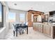 Bright kitchen with an island, custom cabinetry, and views of the outside landscape at 503 Aaron Way, Boulder City, NV 89005