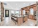Spacious kitchen with a large island, granite countertops, and custom cabinetry at 503 Aaron Way, Boulder City, NV 89005
