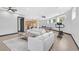Open-concept living room, pool table, adjacent kitchen, and neutral decor at 503 Aaron Way, Boulder City, NV 89005