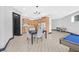 Spacious living room with a dining area and an open concept kitchen with wood cabinets at 503 Aaron Way, Boulder City, NV 89005