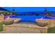 Captivating pool featuring integrated spa, fire bowls, and stunning panoramic views at 503 Aaron Way, Boulder City, NV 89005