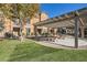 Outdoor community space features covered seating and well-maintained landscaping at 5179 Silica Chalk Ave, Las Vegas, NV 89115