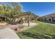 Common outdoor space offers covered seating, well-maintained landscaping, and a welcoming atmosphere at 5179 Silica Chalk Ave, Las Vegas, NV 89115