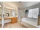 The primary bathroom features tile floors, dual vanities, and a separate shower at 5419 Sharpei Ct, Las Vegas, NV 89131
