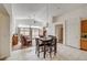 Dining room has large windows, ceiling fan, and access to living room at 5419 Sharpei Ct, Las Vegas, NV 89131