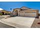 Charming single-story home with a three-car garage and desert landscaping for low maintenance at 5419 Sharpei Ct, Las Vegas, NV 89131