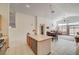 Open-concept kitchen with island and adjacent dining area at 5419 Sharpei Ct, Las Vegas, NV 89131