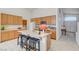 Kitchen features an island, breakfast bar, and plenty of cabinet space at 5419 Sharpei Ct, Las Vegas, NV 89131