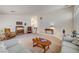 Spacious living room with a combination of carpet and tile flooring and natural light at 5419 Sharpei Ct, Las Vegas, NV 89131