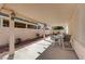 Covered outdoor patio provides shaded seating and overlooks well-kept landscaping with desert plants at 5419 Sharpei Ct, Las Vegas, NV 89131