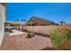 View of patio with patio set and rock landscaping at 5419 Sharpei Ct, Las Vegas, NV 89131