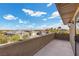 Enjoy the views from this spacious balcony overlooking the neighborhood at 5690 N Park St, Las Vegas, NV 89149
