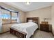 Bright bedroom with large window and neutral decor at 5690 N Park St, Las Vegas, NV 89149
