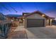 Charming single-Gathering home boasts a tile roof, three-car garage and solar panels at 5690 N Park St, Las Vegas, NV 89149