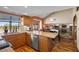 Cozy kitchen with wooden cabinets, stainless steel appliances, and granite countertops at 5690 N Park St, Las Vegas, NV 89149