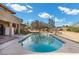 Backyard pool featuring clear water and a patio area for entertaining at 5690 N Park St, Las Vegas, NV 89149