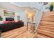 Open-concept living space with dining area, staircase, and view of the kitchen at 5771 Ritter Ln, Las Vegas, NV 89118