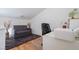 Cozy office area with a comfortable sofa, desk, and stylish decor at 5771 Ritter Ln, Las Vegas, NV 89118