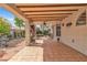 Back patio providing a shaded outdoor living space perfect for dining and entertaining at 6405 Break Point Ave, Las Vegas, NV 89130