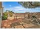 The backyard features desert landscaping, a brick perimeter wall, and patio area at 6405 Break Point Ave, Las Vegas, NV 89130