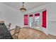 Cozy dining area with breakfast bar seating, adjacent to patio access, and decorative light fixture at 6405 Break Point Ave, Las Vegas, NV 89130