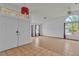 Inviting home foyer with tile flooring, arched windows, and ample natural light at 6405 Break Point Ave, Las Vegas, NV 89130